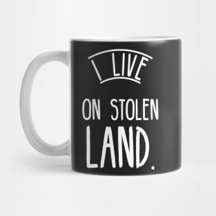 I live on stolen land Mug